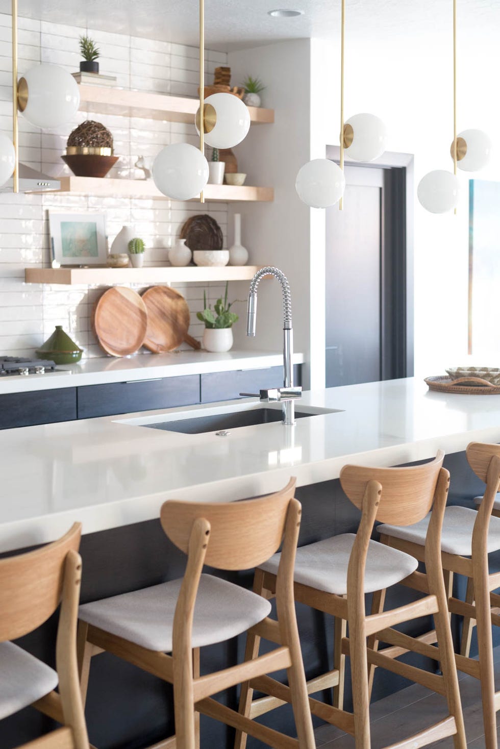 kitchen island idea like long black kitchen island with white top and black sink inset