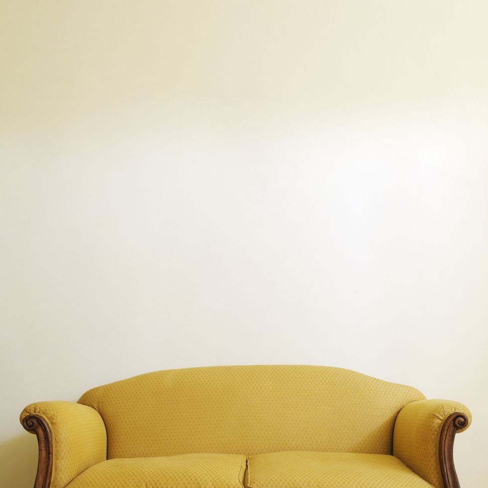 vintage yellow sofa copy space