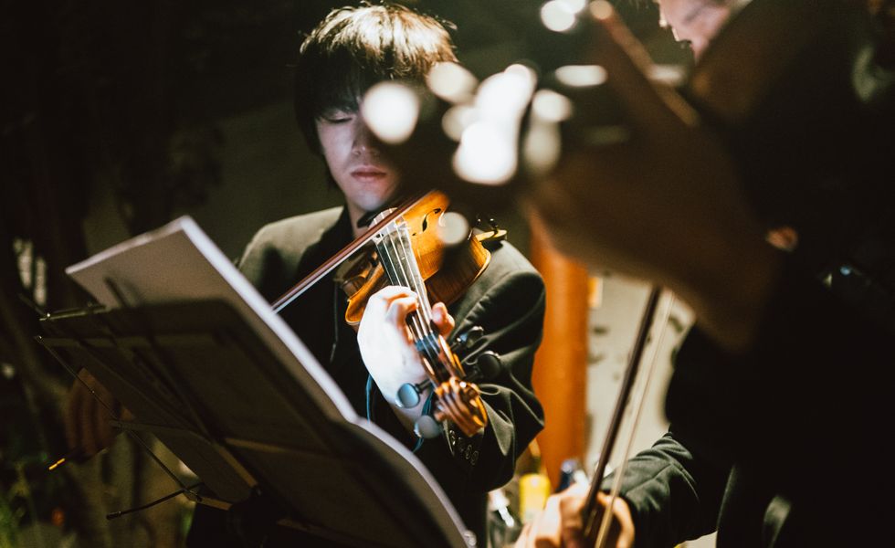 violinist playing on stage
