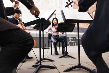 violist katie liu rehearses with a string quartet on an outdoor terrace at the colburn school