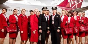 Red, Flight attendant, Team, Crew, Uniform, Airline, Event, Vehicle, Airliner, Job, 