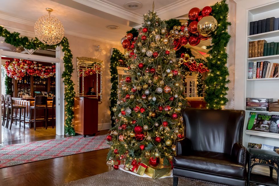 Christmas decoration, Christmas tree, Tree, Christmas, Interior design, Christmas ornament, Room, Architecture, Home, Plant, 