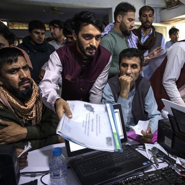 kabul, afg  august 8  afghan afghan special immigrant visa siv applicants crowd into the herat kabul internet cafe applying for the siv program on august 8, 2021 in kabul, afghanistan many afghans are in dire need of support to get assistance with the forms, and the human resources letters needed as in some cases, years have passed since they held their jobsthe biden administration expanded refugee eligibility for afghans as the taliban escalates violence in the war torn country photo by paula bronstein getty images