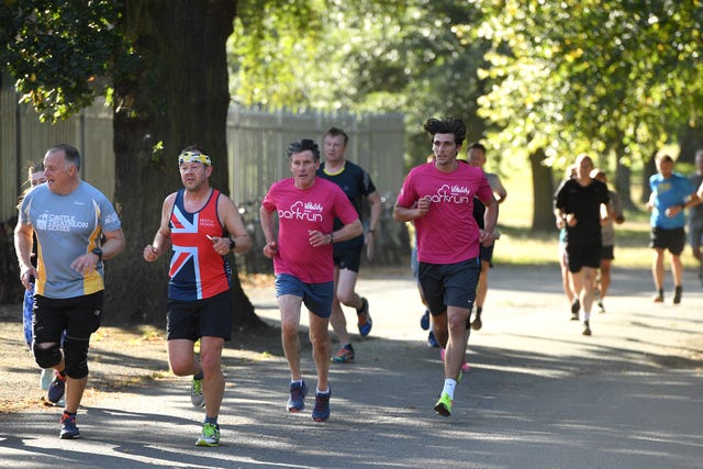 vitality ambassador and olympic legend seb coe joins hundreds of runners at a bespoke parkrun event