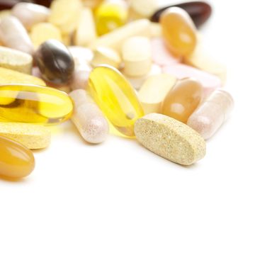 vitamin supplements on white