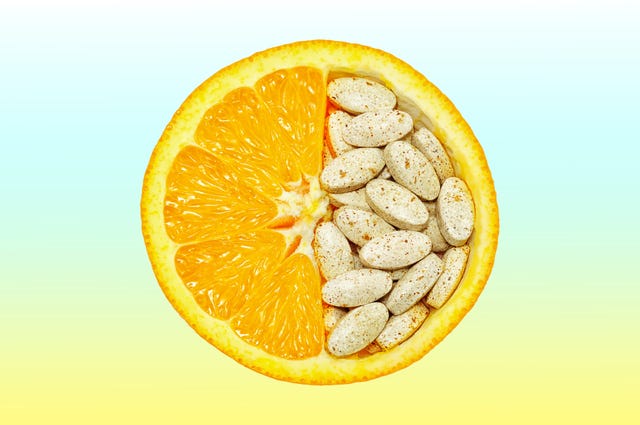 half an orange with the other half filled with ovalshaped tablets