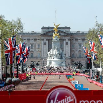 thousands of runners and spectators take to the streets for the london marathon