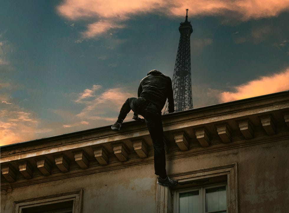 a person jumping off a building