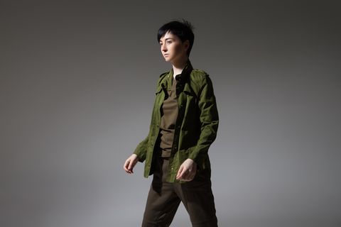 woman in military inspired jacket