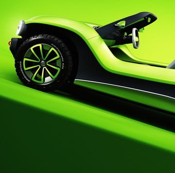 a green car with a black top