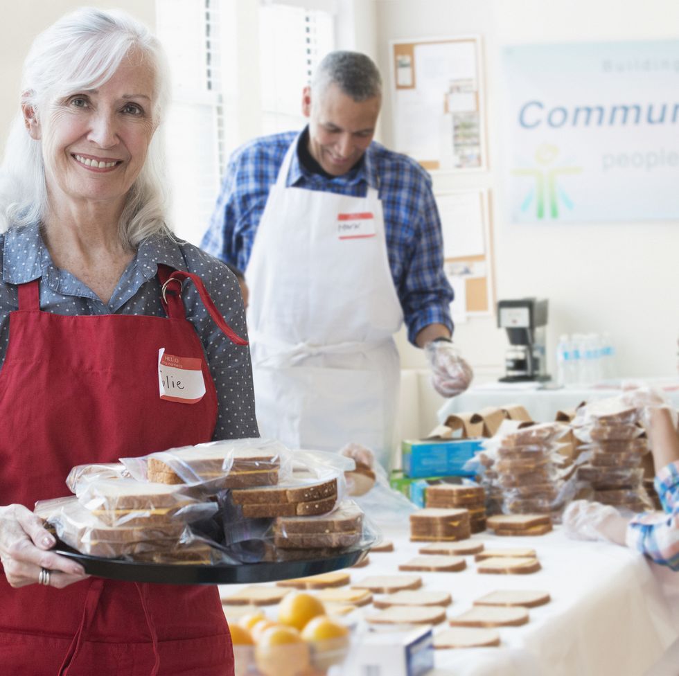 staycation ideas - Volunteers packing food in community kitchen
