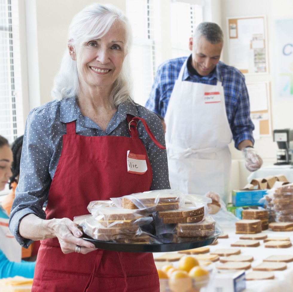 staycation ideas - Volunteers packing food in community kitchen