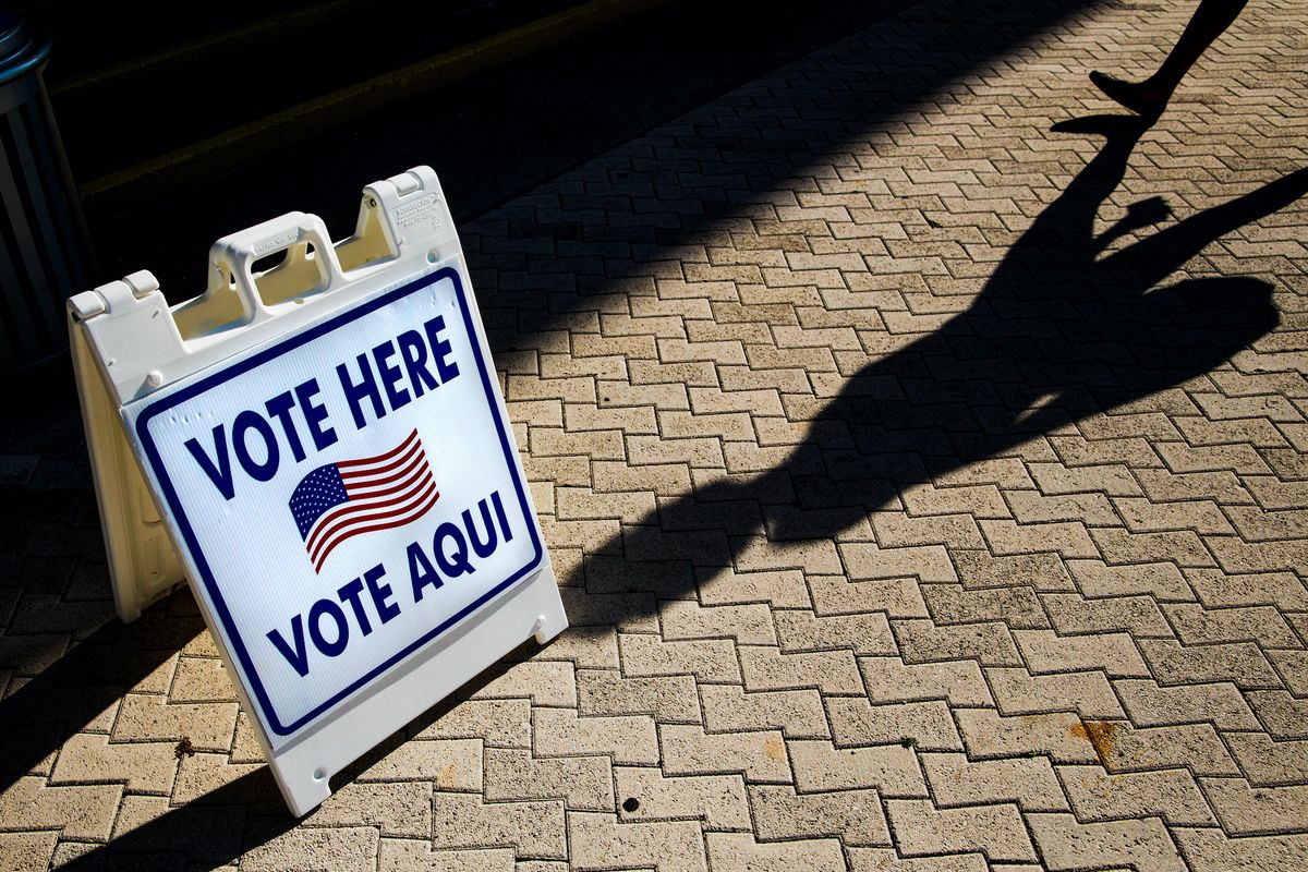 a vote here sign outside a polling location in miami beach, florida, us photographer scott mcintyrebloomberg