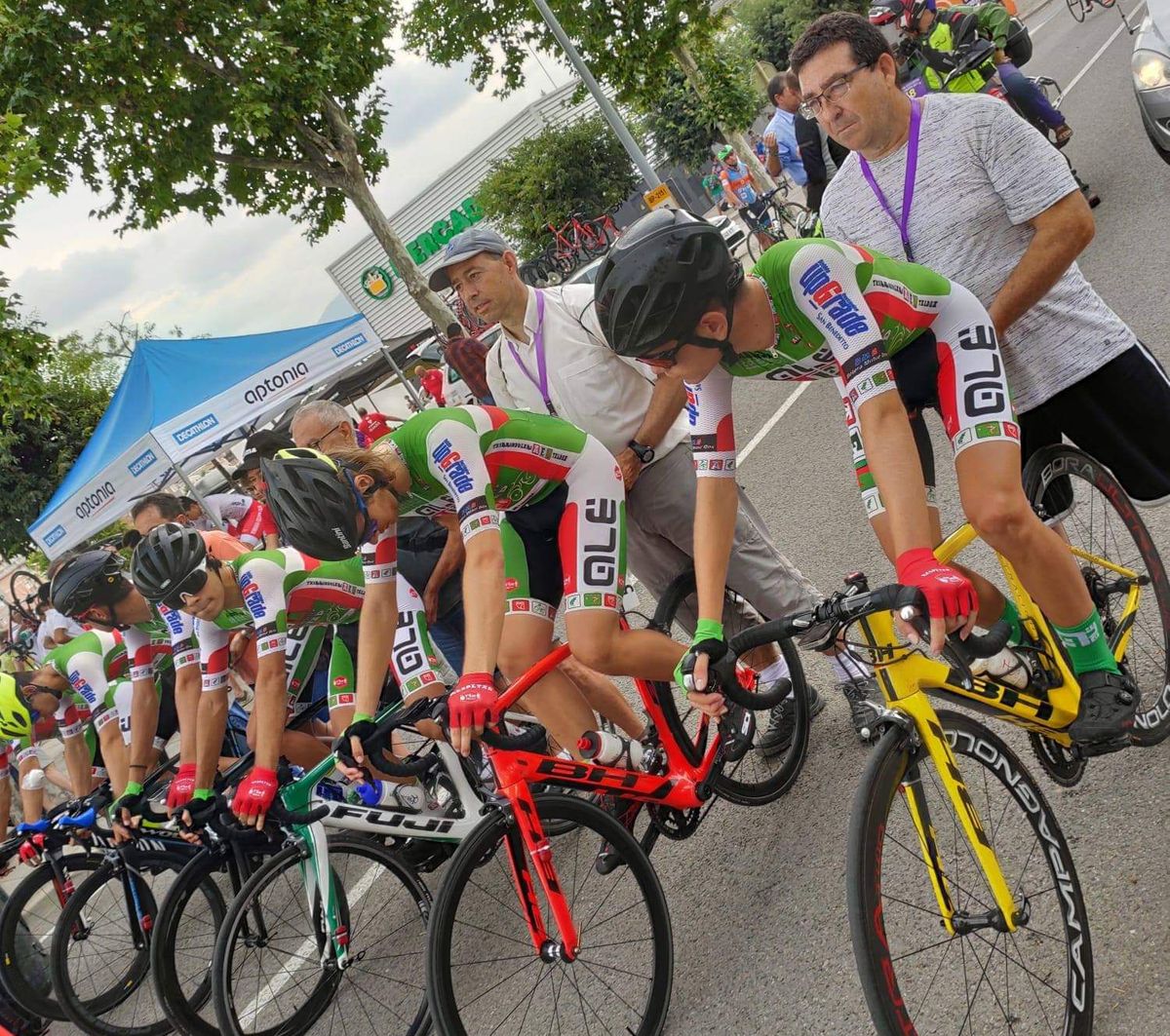 Junior racers line up at the start of the Vuelta al Penedés team time trial in Spain.