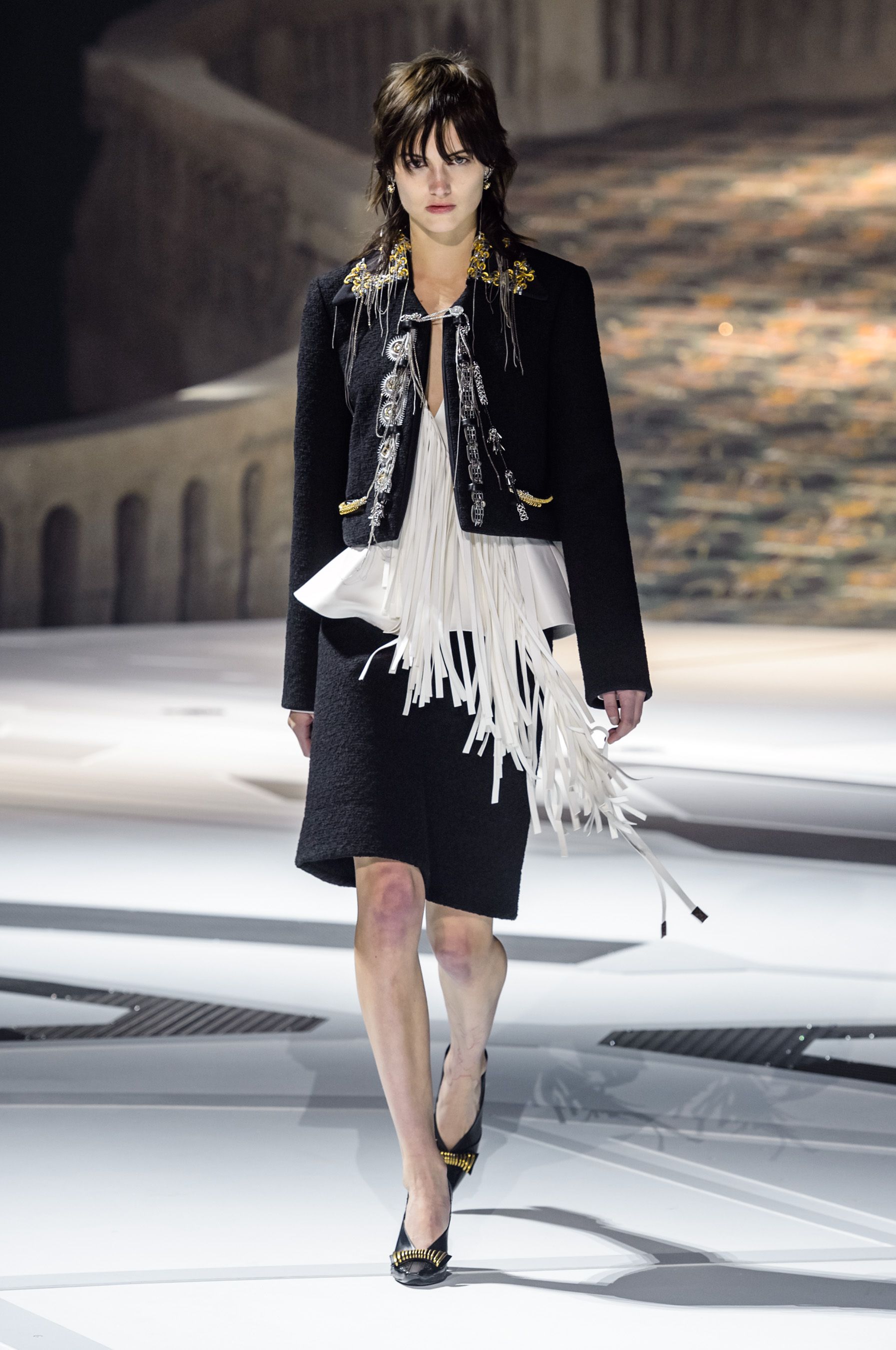 MILAN, ITALY - SEPTEMBER 22, 2018: Woman with Louis Vuitton skirt