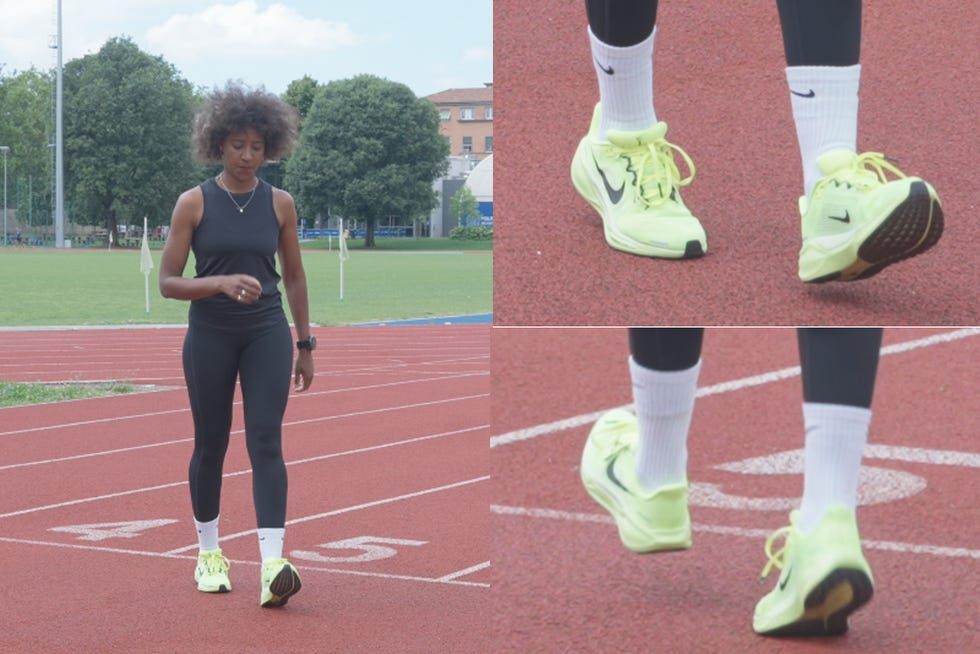 a woman running on a track