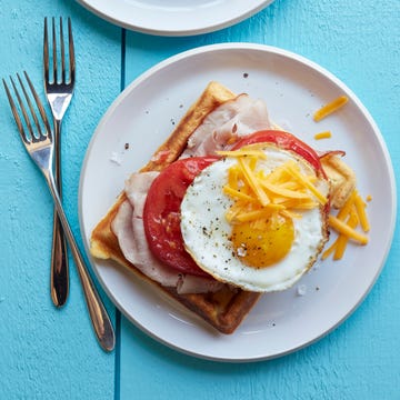 breakfast in bed mama's homemade waffles with fruit and eggs toppings