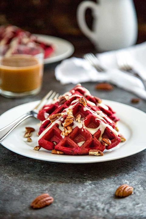 red velvet waffles with cream cheese glaze and pecans