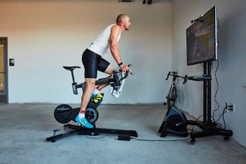 a man on an indoor bicycle