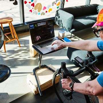 a person using zwift on an indoor trainer