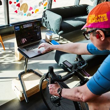 a person using zwift on an indoor trainer