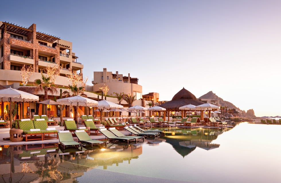 the pool deck at the waldorf astoria pedregal in los cabos