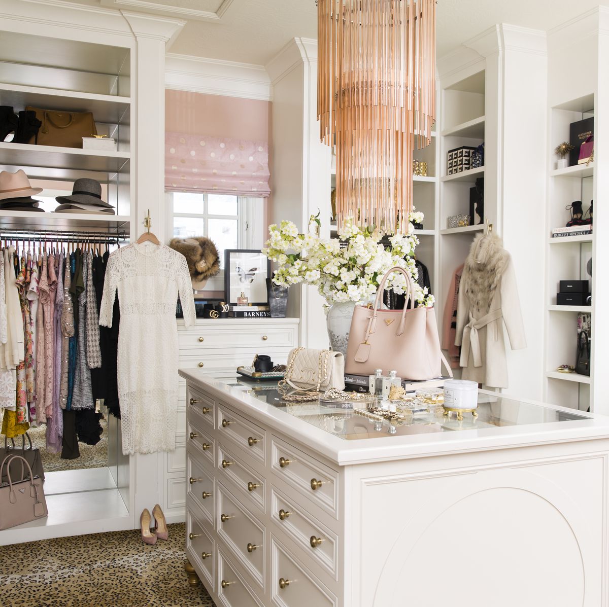 rachel-parcell-luxury-closet-hollywood-glam-regency-leopard-carpet-rug-pink-chandelier  - The Glam Pad