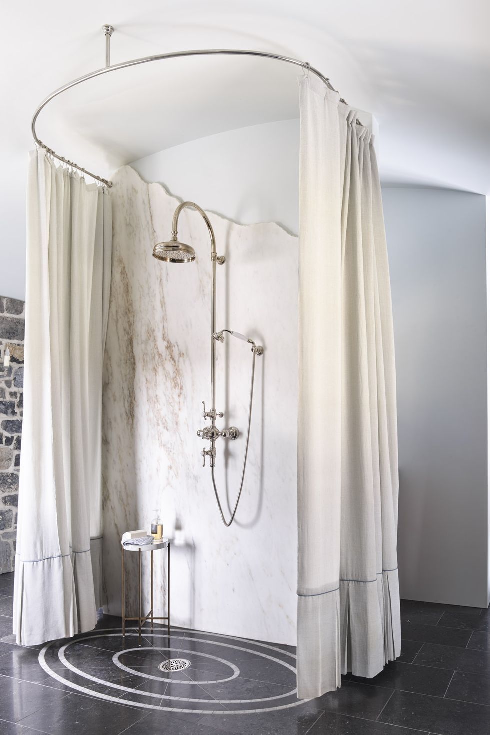 a shower curtain with a shower head