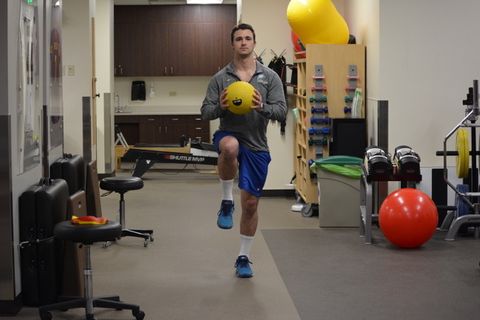 Walking lunge with medicine ball press