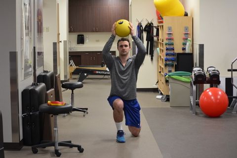 Walking lunge with medicine ball press