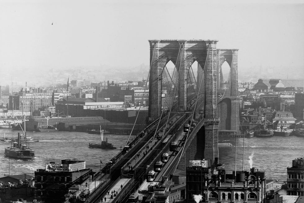 aerial photo of the brooklyn bridge over the east river