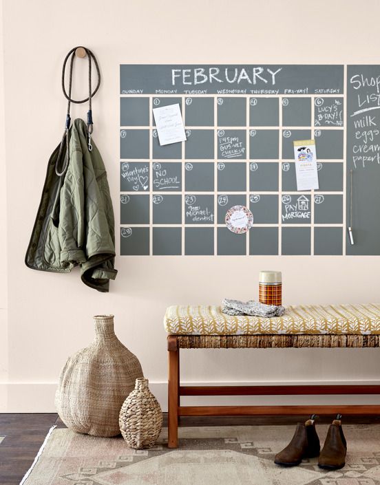 a calendar grid painted on a wall with chalk paint