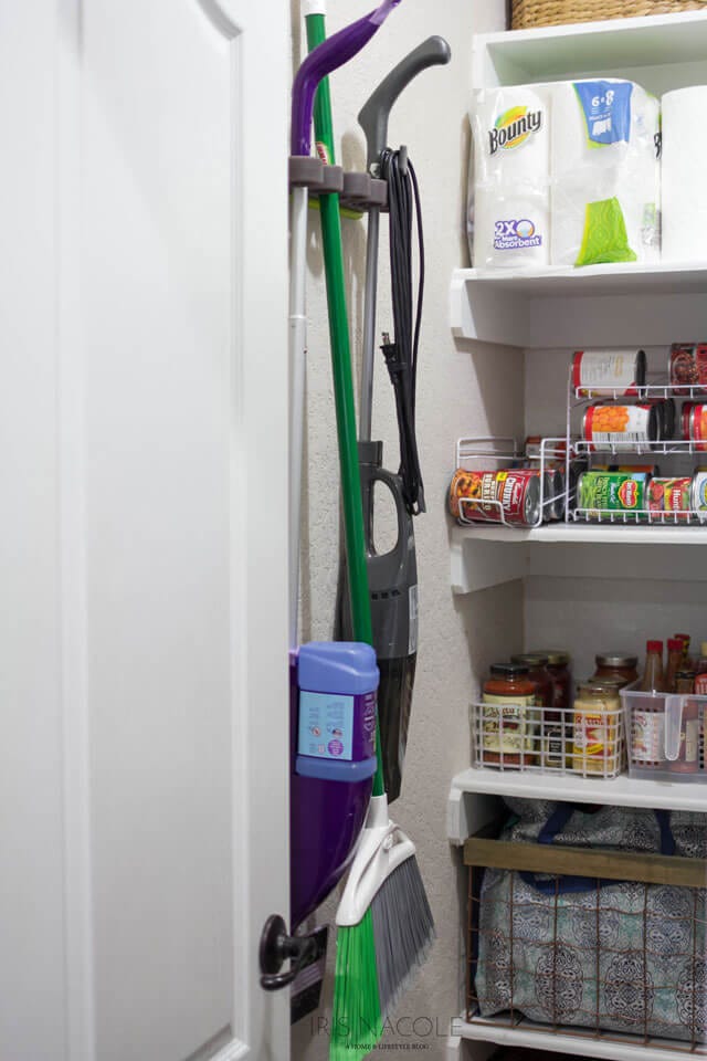 storage area featuring cleaning tools and pantry supplies