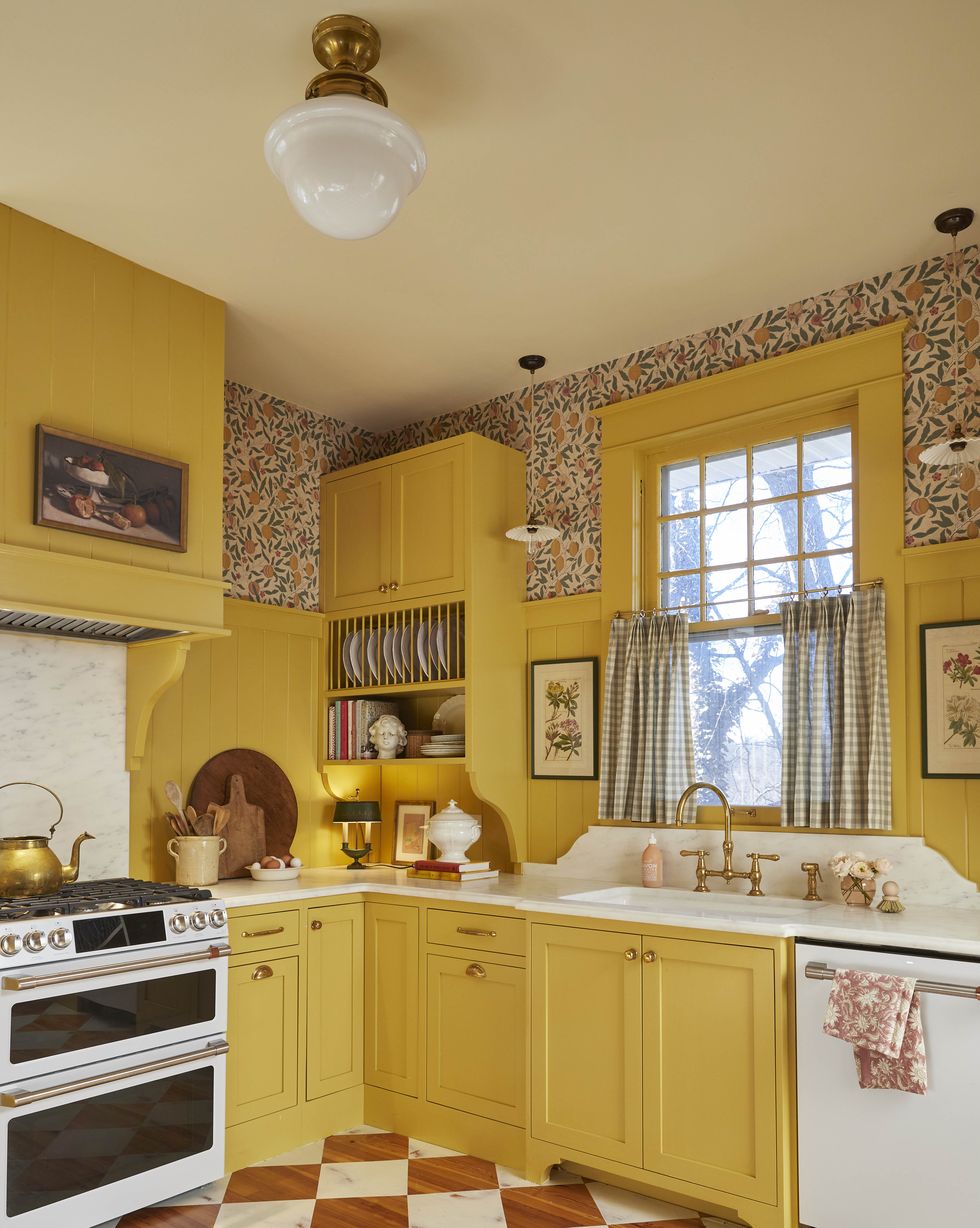 yellow kitchen with wallpaper