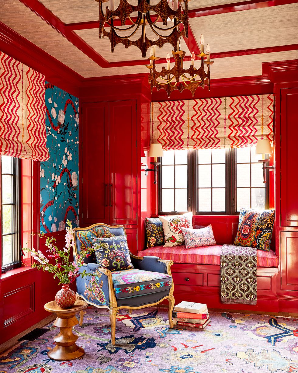 red room with wallpapered ceiling