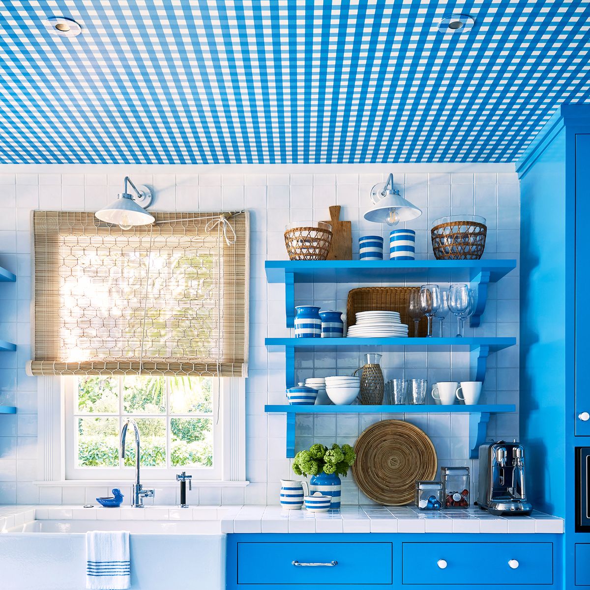 blue and white gingham kitchen with wallpapered ceiling