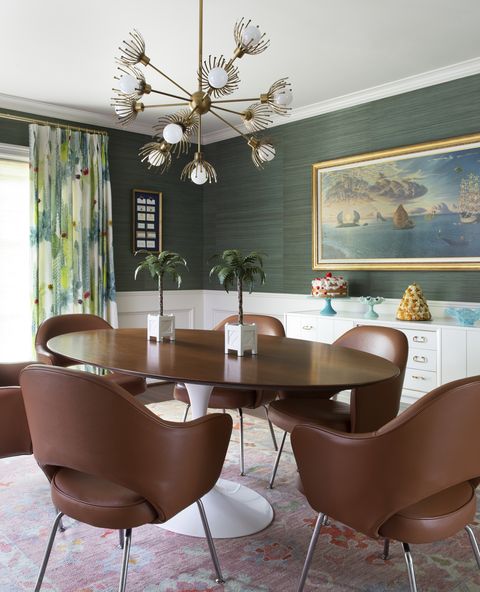 dining room with green textured wallpaper