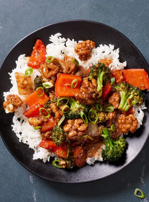 walnut  broccoli stirfry on white rice with red bell peppers and glazy sauce