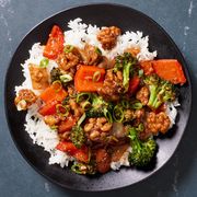 walnut  broccoli stirfry on white rice with red bell peppers and glazy sauce