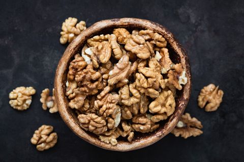 Walnuts in bowl top view