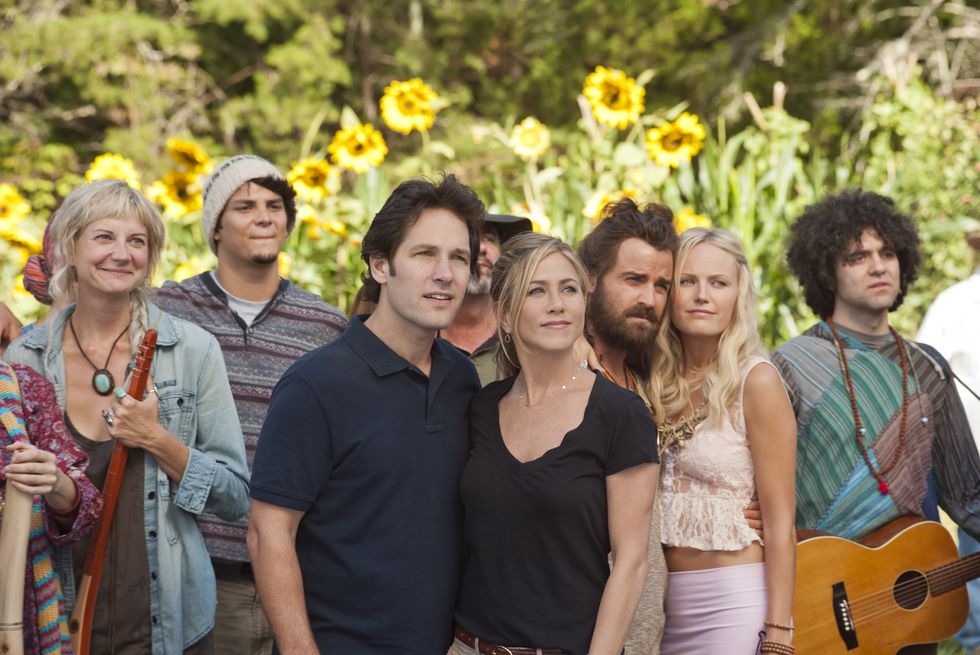 l to r, foreground kathy kerri kenney silver, george paul rudd, linda jennifer aniston, seth justin theroux and eva malin akerman at elysium in wanderlust, the raucous new comedy from director david wain and producer judd apatow about a harried couple who leave the pressures of the big city and join a freewheeling community where the only rule is to be yourself