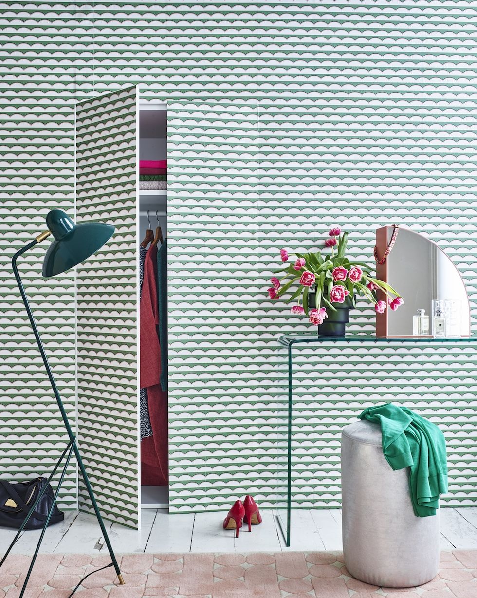 built in wardrobe wallpaper wes anderson style tulips dressing room flower painted floorboards bedroom decorate