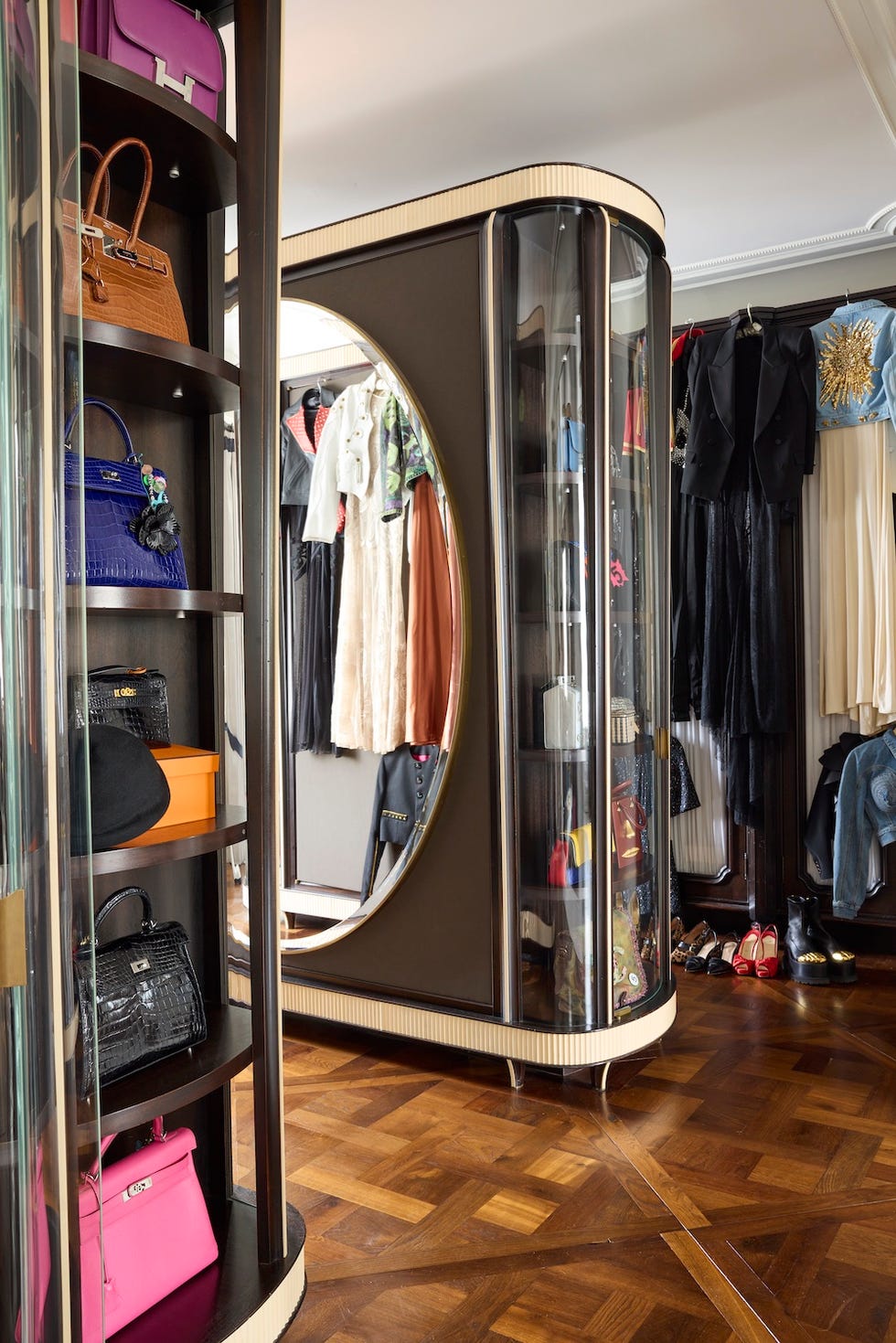 clothing and accessories displayed in an organized wardrobe