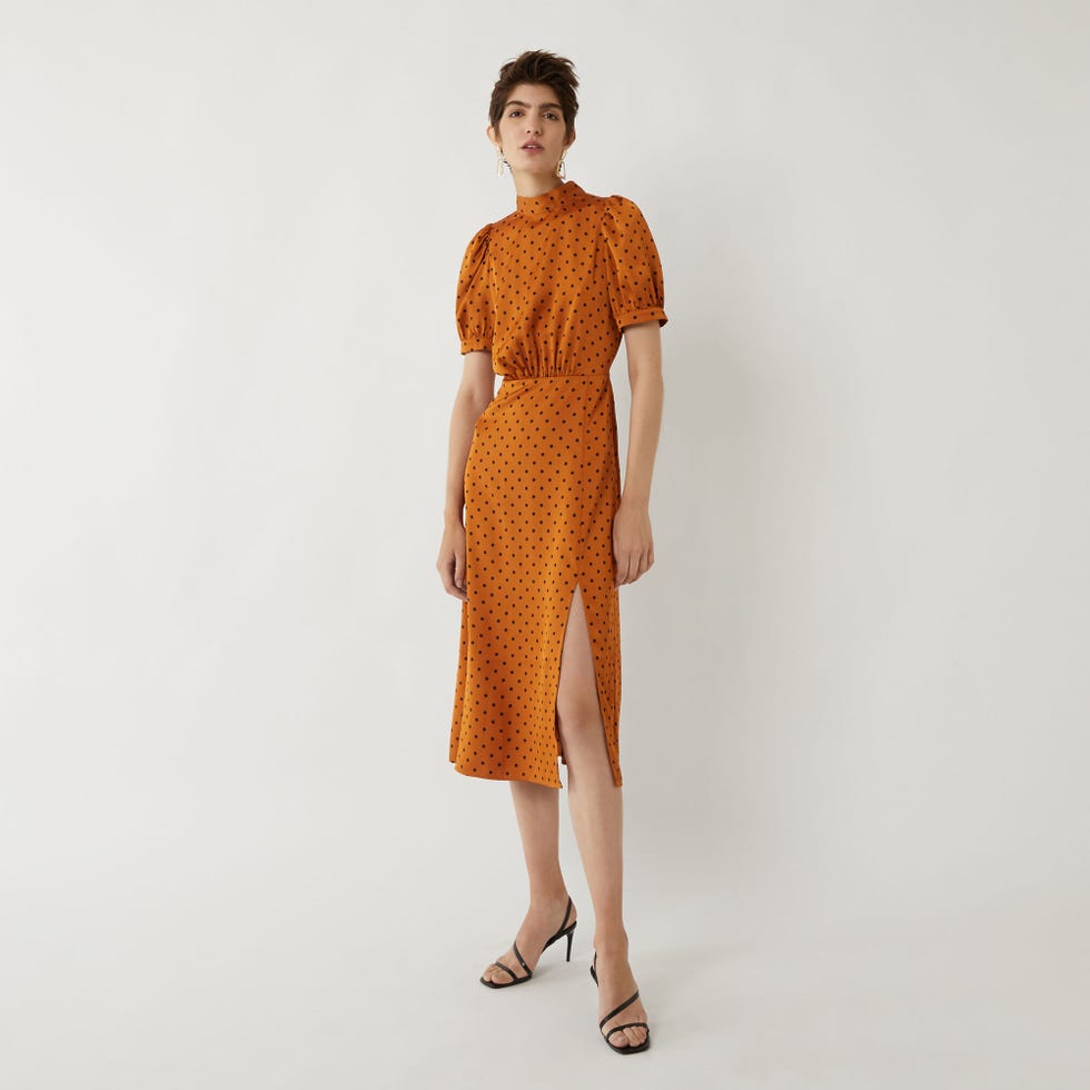 Clothing, Fashion model, Day dress, Dress, Shoulder, Cocktail dress, Orange, Sleeve, Neck, One-piece garment, 