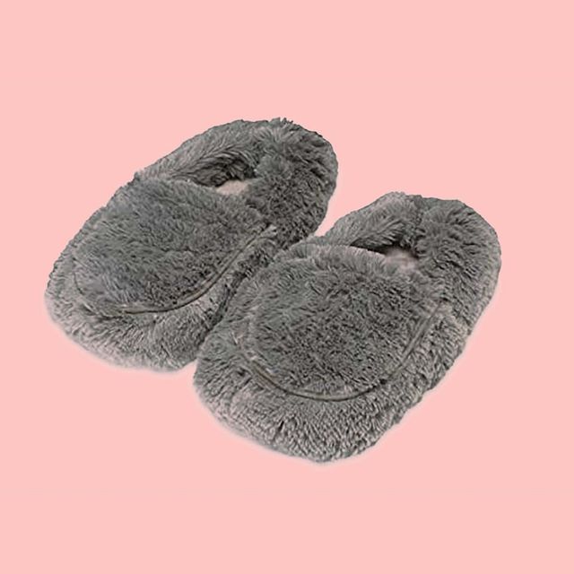 gray slippers with pink background