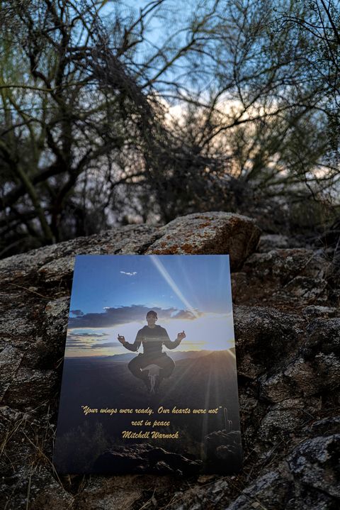 tempe, arizona, august 29th, 2020south mountain state park, warpaint traillorie warnock with photographs of her son, mitch, who died in 2016 at 18 years old this was where he spent his last afternoonwith karianna blanchard, eduarda shorder, suzanne whitakerphoto by adriana zehbrauskas for esquire
