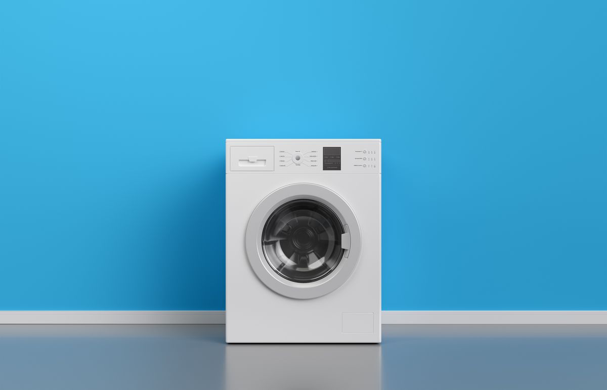 washing machine at blue wall, frontal view with copy space,3d rendering general design and captions