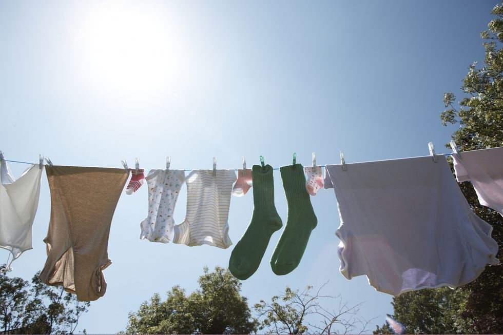 washing on line one pair of green socks