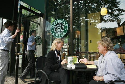 patrons talk outside a starbucks store 2