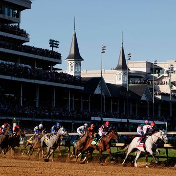 louisville, kentucky   may 01 medina spirit 8, ridden by jockey john velazquez, leads the field around the first during the 147th running of the kentucky derby at churchill downs on may 01, 2021 in louisville, kentucky photo by sarah stiergetty images